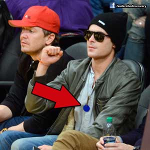 Zac-Efron-Sports-Sobriety-Chip-at-Lakers-Game